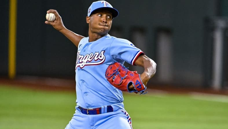 Sep 11, 2022; Arlington, Texas, USA; Texas Rangers relief pitcher Jose Leclerc (25) pitches against the Toronto Blue Jays during the ninth inning at Globe Life Field. Mandatory Credit: Jerome Miron-USA TODAY Sports