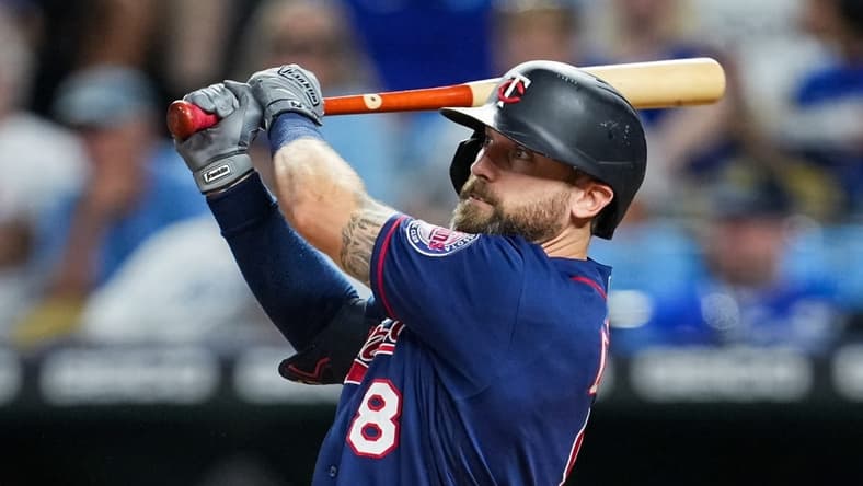 Sep 20, 2022; Kansas City, Missouri, USA; Minnesota Twins left fielder Jake Cave (8) bats against the Kansas City Royals during the eighth inning at Kauffman Stadium. Mandatory Credit: Jay Biggerstaff-USA TODAY Sports
