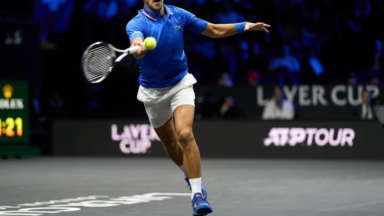 Sep 25, 2022; London, United Kingdom; Novak Djokovic (SRB) plays a shot against Felix Auger-Aliassime (CAN) in Lavers Cup singles. Mandatory Credit: Peter van den Berg-USA TODAY Sports