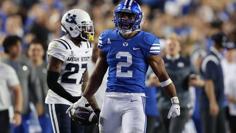 Sep 29, 2022; Provo, Utah, USA; Brigham Young Cougars running back Christopher Brooks (2) reacts in the fourth quarter against the Utah State Aggies at LaVell Edwards Stadium. Mandatory Credit: Rob Gray-USA TODAY Sports