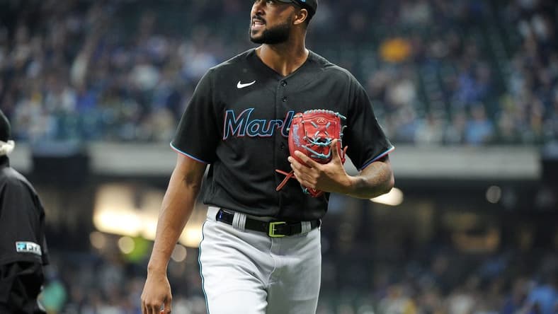 Sep 30, 2022; Milwaukee, Wisconsin, USA; Miami Marlins starting pitcher Sandy Alcantara (22) walks off the field against the Milwaukee Brewers after the seventh inning at American Family Field. Mandatory Credit: Michael McLoone-USA TODAY Sports