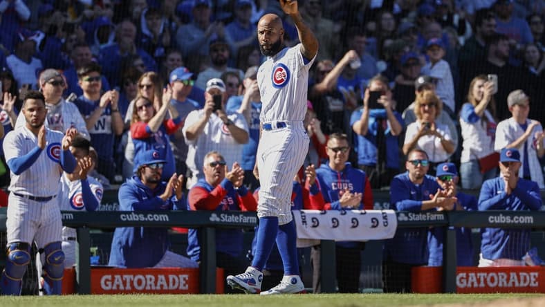 Oct 1, 2022; Chicago, Illinois, USA; Chicago Cubs Jason Heyward is being honored during a baseball game between the Chicago Cubs and Cincinnati Reds at Wrigley Field. Mandatory Credit: Kamil Krzaczynski-USA TODAY Sports