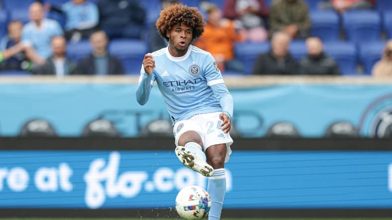Oct 2, 2022; Harrison, New Jersey, USA; New York City FC defender Tayvon Gray (24) passes the ball against Orlando City SC during the first half at Red Bull Arena. Mandatory Credit: Vincent Carchietta-USA TODAY Sports