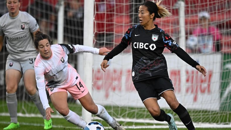 Oct 2, 2022; Bridgeview, Illinois, USA; Chicago Red Stars forward Yuki Nagasato (7) controls the ball during the second half against Angel City FC at SeatGeek Stadium. Mandatory Credit: Daniel Bartel-USA TODAY Sports