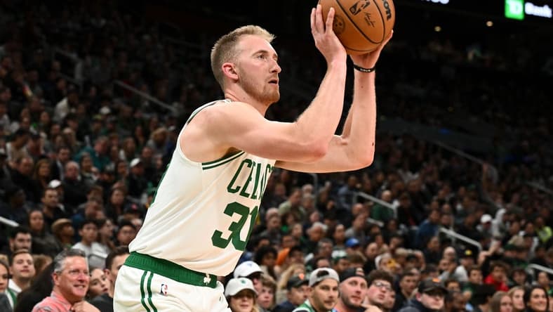 Oct 5, 2022; Boston, Massachusetts, USA; Boston Celtics forward Sam Hauser (30) attempts a three-point basket Toronto Raptors during the second half at the TD Garden. Mandatory Credit: Brian Fluharty-USA TODAY Sports