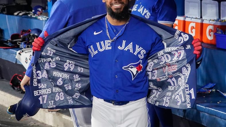 Oct 8, 2022; Toronto, Ontario, CAN; Toronto Blue Jays right fielder Teoscar Hernandez (37) celebrates in the dugout after hitting a solo home run in the fourth inning against the Seattle Mariners during game two of the Wild Card series for the 2022 MLB Playoffs at Rogers Centre. Mandatory Credit: John E. Sokolowski-USA TODAY Sports