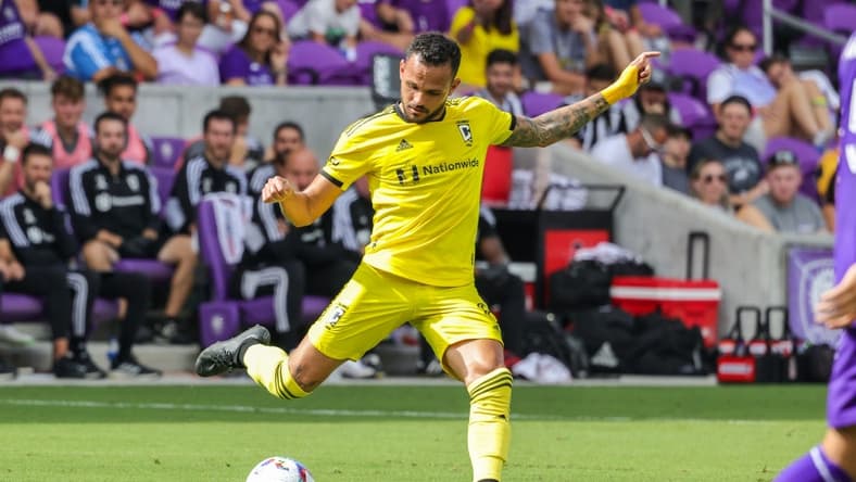 Oct 9, 2022; Orlando, Florida, USA; Columbus Crew midfielder Artur (8) kicks the ball during the first half against the Orlando City at Exploria Stadium. Mandatory Credit: Mike Watters-USA TODAY Sports