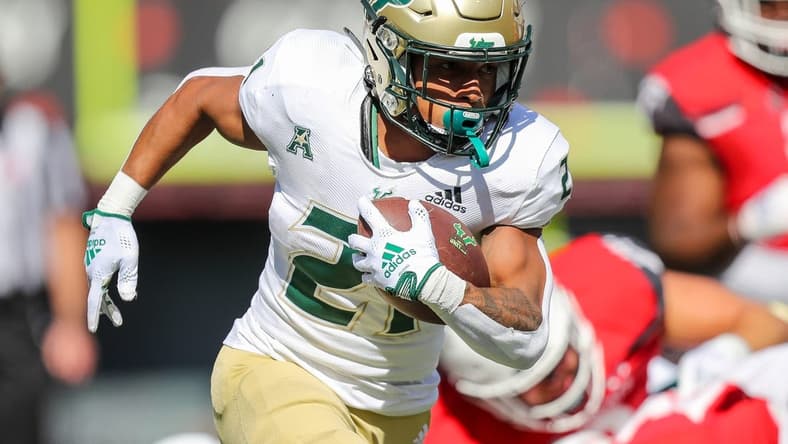 Oct 8, 2022; Cincinnati, Ohio, USA; South Florida Bulls running back Brian Battie (21) runs with the ball against the Cincinnati Bearcats in the first half at Nippert Stadium. Mandatory Credit: Katie Stratman-USA TODAY Sports