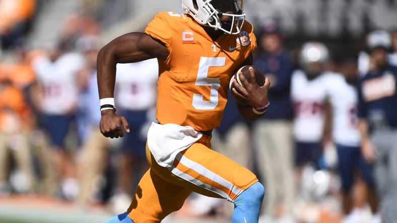 Tennessee quarterback Hendon Hooker (5) scrambles out of pocket during the NCAA college football game against UT Martin on Saturday, October 22, 2022 in Knoxville, Tenn.

Utvmartin1012