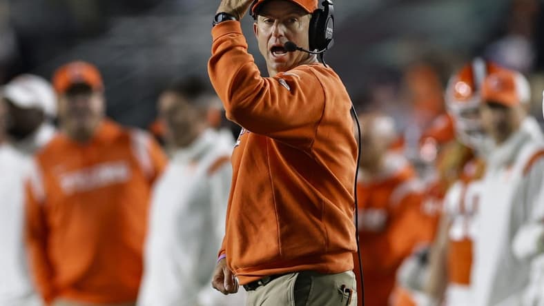 Oct 8, 2022; Chestnut Hill, Massachusetts, USA; Clemson Tigers head coach Dabo Swinney calls plays during the second half against the Boston College Eagles at Alumni Stadium. Mandatory Credit: Winslow Townson-USA TODAY Sports