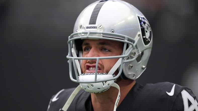 Oct 23, 2022; Paradise, Nevada, USA; Las Vegas Raiders quarterback Derek Carr (4) warms up before a game against the Houston Texans at Allegiant Stadium. Mandatory Credit: Stephen R. Sylvanie-USA TODAY Sports