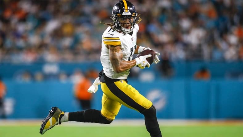 Oct 23, 2022; Miami Gardens, Florida, USA; Pittsburgh Steelers wide receiver Chase Claypool (11) runs with the football during the second quarter against the Miami Dolphins at Hard Rock Stadium. Mandatory Credit: Sam Navarro-USA TODAY Sports