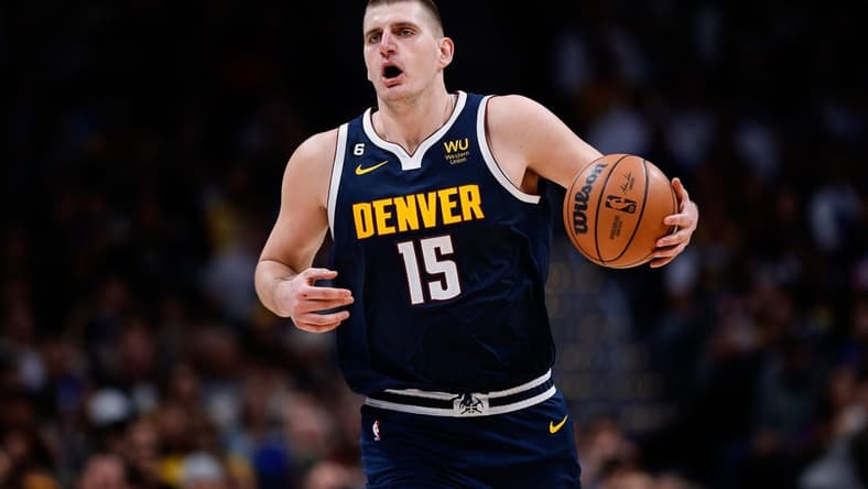 Oct 26, 2022; Denver, Colorado, USA; Denver Nuggets center Nikola Jokic (15) controls the ball in the fourth quarter against the Los Angeles Lakers at Ball Arena. Mandatory Credit: Isaiah J. Downing-USA TODAY Sports