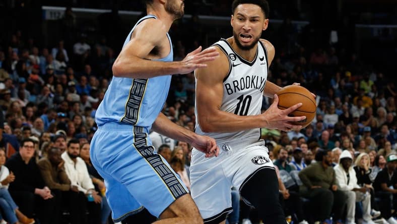 Oct 24, 2022; Memphis, Tennessee, USA; Brooklyn Nets guard Ben Simmons (10) drives to the basket as Memphis Grizzlies forward Santi Aldama (7) defends during the second half at FedExForum. Mandatory Credit: Petre Thomas-USA TODAY Sports