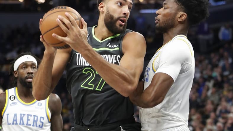 Oct 28, 2022; Minneapolis, Minnesota, USA; Minnesota Timberwolves center Rudy Gobert (27) works against Los Angeles Lakers center Damian Jones (30) in the first quarter at Target Center. Mandatory Credit: Bruce Kluckhohn-USA TODAY Sports