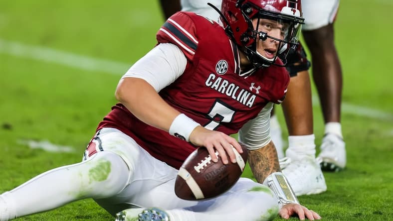 Oct 29, 2022; Columbia, South Carolina, USA; South Carolina Gamecocks quarterback Spencer Rattler (7) reacts after being sacked by the Missouri Tigers in the second half at Williams-Brice Stadium. Mandatory Credit: Jeff Blake-USA TODAY Sports