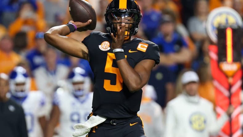 Oct 29, 2022; Knoxville, Tennessee, USA; Tennessee Volunteers quarterback Hendon Hooker (5) passes the ball against the Kentucky Wildcats during the first quarter at Neyland Stadium. Mandatory Credit: Randy Sartin-USA TODAY Sports