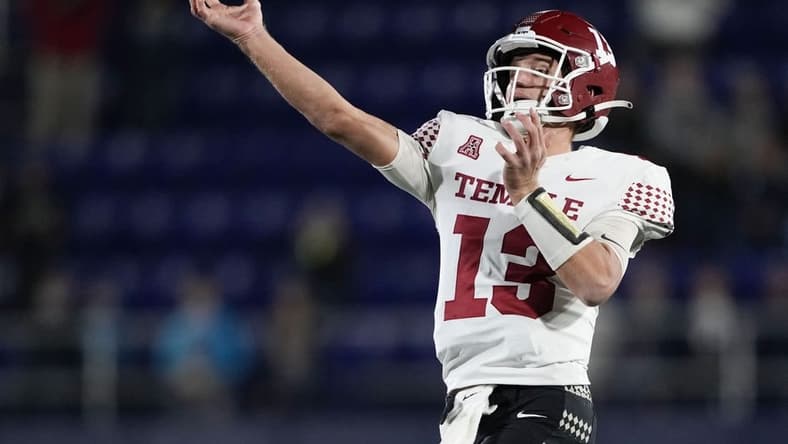 Oct 29, 2022; Annapolis, Maryland, USA; Temple Owls quarterback E.J. Warner (13) throws an interception in overtime against the Navy Midshipmen at Navy-Marine Corps Memorial Stadium. Mandatory Credit: Brent Skeen-USA TODAY Sports
