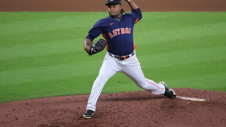 Oct 29, 2022; Houston, Texas, USA; Houston Astros starting pitcher Framber Valdez (59) throws a pitch against the Philadelphia Phillies during the fifth inning in game two of the 2022 World Series at Minute Maid Park. Mandatory Credit: Erik Williams-USA TODAY Sports