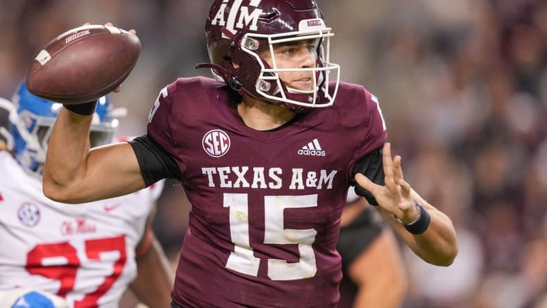 Oct 29, 2022; College Station, Texas, USA;  Texas A&M Aggies quarterback Conner Weigman (15) throws a pass against the Mississippi Rebels in the second half at Kyle Field. Mandatory Credit: Daniel Dunn-USA TODAY Sports