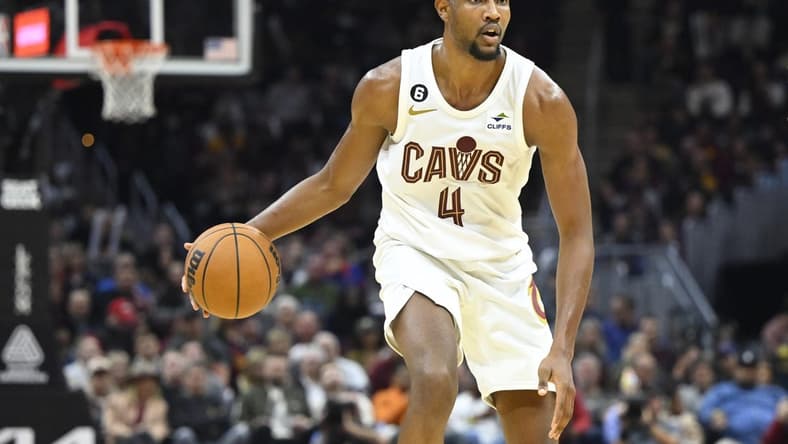 Oct 30, 2022; Cleveland, Ohio, USA; Cleveland Cavaliers forward Evan Mobley (4) dribbles the ball in the third quarter against the New York Knicks at Rocket Mortgage FieldHouse. Mandatory Credit: David Richard-USA TODAY Sports