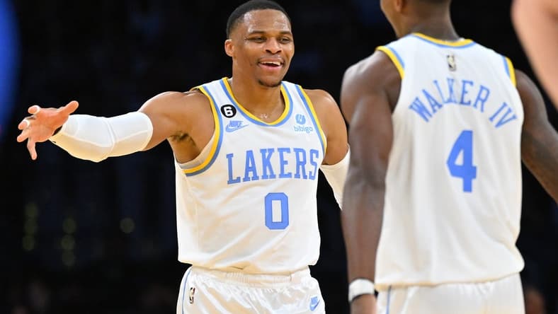 Oct 30, 2022; Los Angeles, California, USA; Los Angeles Lakers guard Russell Westbrook (0) celebrates with guard Lonnie Walker IV (4) after a 3 point basket in the second half against the Denver Nuggets at Crypto.com Arena. Mandatory Credit: Jayne Kamin-Oncea-USA TODAY Sports