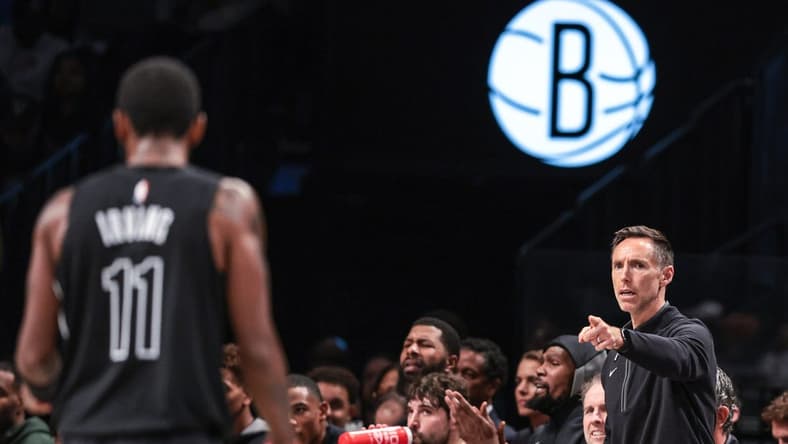 Oct 31, 2022; Brooklyn, New York, USA; Brooklyn Nets head coach Steve Nash (right) points towards guard Kyrie Irving (11) during the first half against the Indiana Pacers at Barclays Center. Mandatory Credit: Vincent Carchietta-USA TODAY Sports