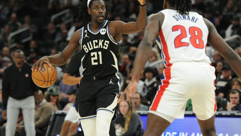 Oct 31, 2022; Milwaukee, Wisconsin, USA; Milwaukee Bucks guard Jrue Holiday (21) brings the ball up the court against Detroit Pistons center Isaiah Stewart (28) at Fiserv Forum. Mandatory Credit: Michael McLoone-USA TODAY Sports