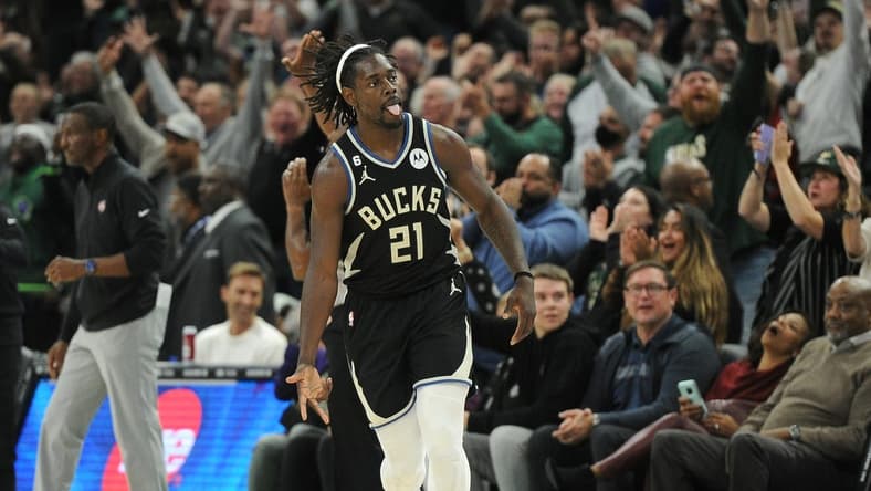 Oct 31, 2022; Milwaukee, Wisconsin, USA; Milwaukee Bucks guard Jrue Holiday (21) celebrates after a three-point basket in the fourth quarter against the Detroit Pistons at Fiserv Forum. Mandatory Credit: Michael McLoone-USA TODAY Sports