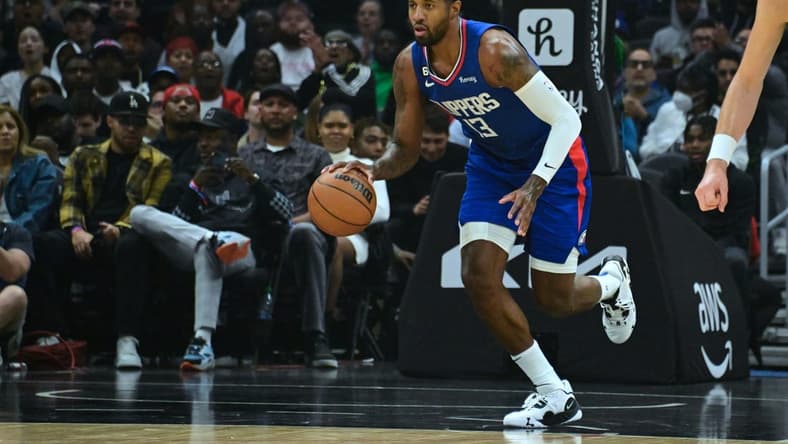 Oct 31, 2022; Los Angeles, California, USA; LA Clippers guard Paul George (13) dribbles down court in the first half against the Houston Rockets at Crypto.com Arena. Mandatory Credit: Richard Mackson-USA TODAY Sports
