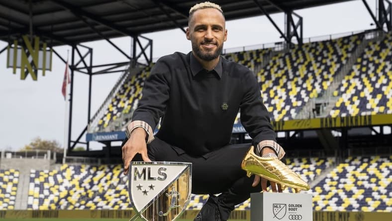 Nov 1, 2022; Nashville, Tennessee, USA;Nashville SC's Hany Mukhtar poses with his Landon Donovan MLS MVP and MLS Golden Boot awards on the field at Geodis Park.  Mandatory Credit: George Walker IV - USA TODAY Sports