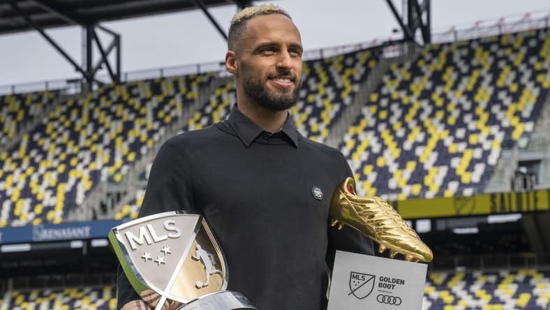 Nov 1, 2022; Nashville, Tennessee, USA;Nashville SC's Hany Mukhtar holds his Landon Donovan MLS MVP and his MLS Golden Boot awards as he poses for a portrait at Geodis Park.  Mandatory Credit: George Walker IV - USA TODAY Sports