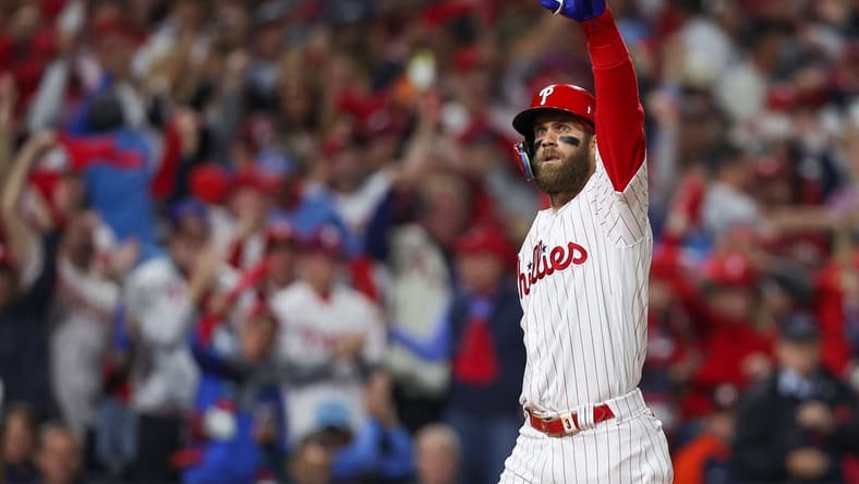 Nov 1, 2022; Philadelphia, PA, USA; Philadelphia Phillies designated hitter Bryce Harper (3) reacts after hitting a two run home run against the Houston Astros during the first inning in game three of the 2022 World Series at Citizens Bank Park. Mandatory Credit: Bill Streicher-USA TODAY Sports