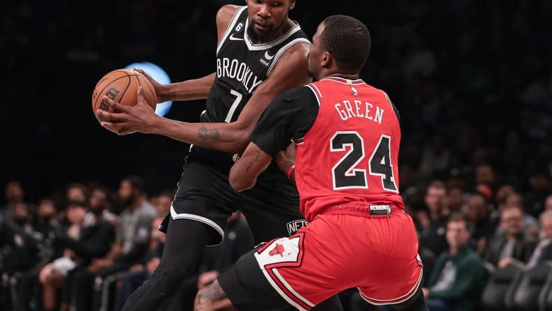 Nov 1, 2022; Brooklyn, New York, USA; Brooklyn Nets forward Kevin Durant (7) shields the ball from Chicago Bulls forward Javonte Green (24) during the first half at Barclays Center. Mandatory Credit: Vincent Carchietta-USA TODAY Sports