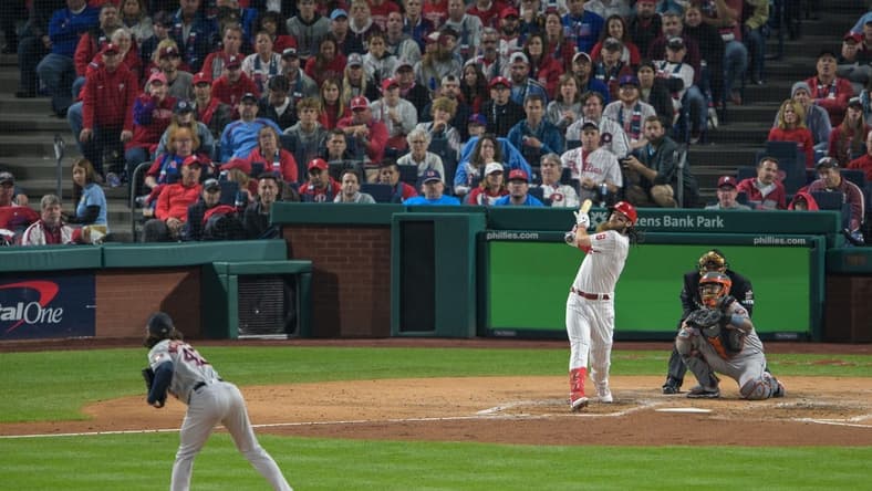 Nov 1, 2022; Philadelphia, PA, USA; Philadelphia Phillies center fielder Brandon Marsh (16) hits a solo home run off of Houston Astros starting pitcher Lance McCullers Jr. (43) during the second inning in game three of the 2022 World Series at Citizens Bank Park. Mandatory Credit: John Geliebter-USA TODAY Sports