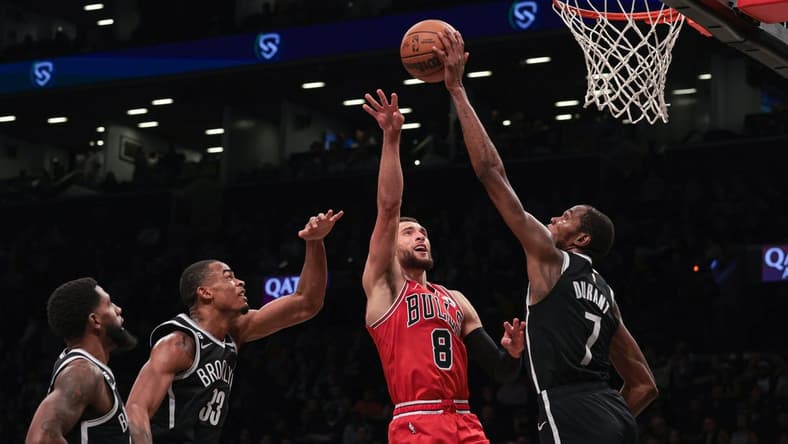Nov 1, 2022; Brooklyn, New York, USA; Brooklyn Nets forward Kevin Durant (7) blocks a shot by Chicago Bulls guard Zach LaVine (8) during the second half at Barclays Center. Mandatory Credit: Vincent Carchietta-USA TODAY Sports