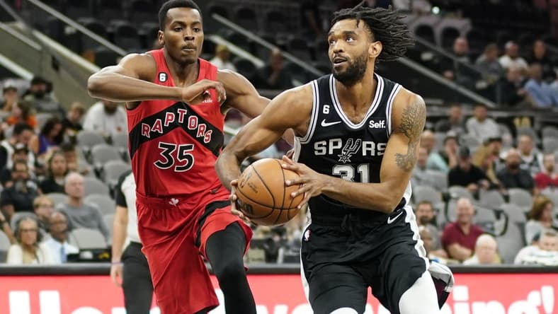 Nov 2, 2022; San Antonio, Texas, USA; San Antonio Spurs forward Keita Bates-Diop (31) drives to the basket against Toronto Raptors center Christian Koloko (35) during the first half at AT&T Center. Mandatory Credit: Scott Wachter-USA TODAY Sports