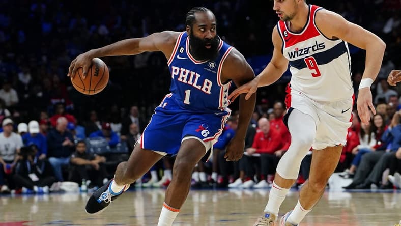 Nov 2, 2022; Philadelphia, Pennsylvania, USA; Philadelphia 76ers guard James Harden (1) dribbles against Washington Wizards forward Deni Avdija (9) during the second half at Wells Fargo Center. Mandatory Credit: Gregory Fisher-USA TODAY Sports