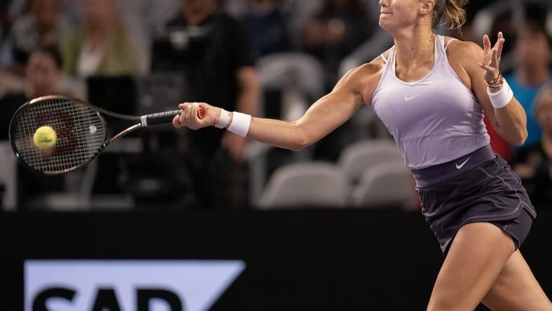 Nov 4, 2022; Forth Worth, TX, USA; Aryna Sabalenka returns a shot during her match against Jessica Pegula (USA) on day five of the WTA Finals at Dickies Arena. Mandatory Credit: Susan Mullane-USA TODAY Sports