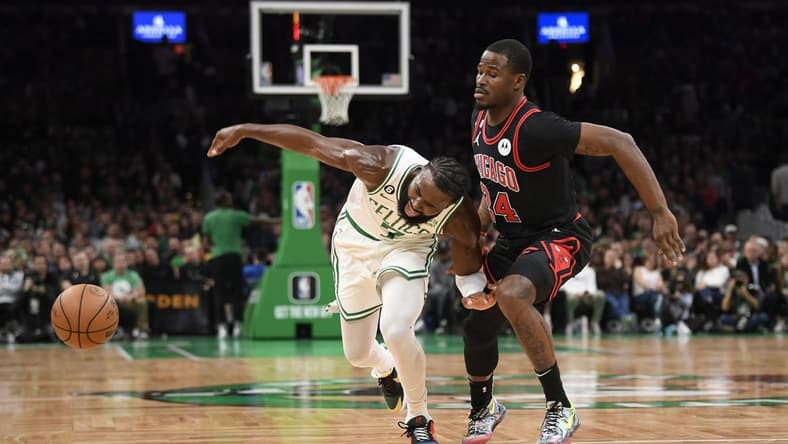 Nov 4, 2022; Boston, Massachusetts, USA; Boston Celtics guard Jaylen Brown (7) loses the ball while Chicago Bulls forward Javonte Green (24) defends during the first half at TD Garden. Mandatory Credit: Bob DeChiara-USA TODAY Sports