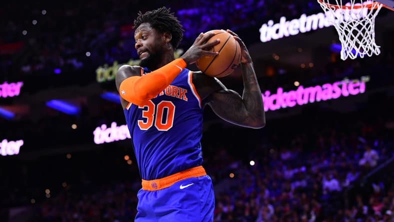 Nov 4, 2022; Philadelphia, Pennsylvania, USA; New York Knicks forward Julius Randle (30) secures a rebound against the Philadelphia 76ers in the fourth quarter at Wells Fargo Center. Mandatory Credit: Kyle Ross-USA TODAY Sports