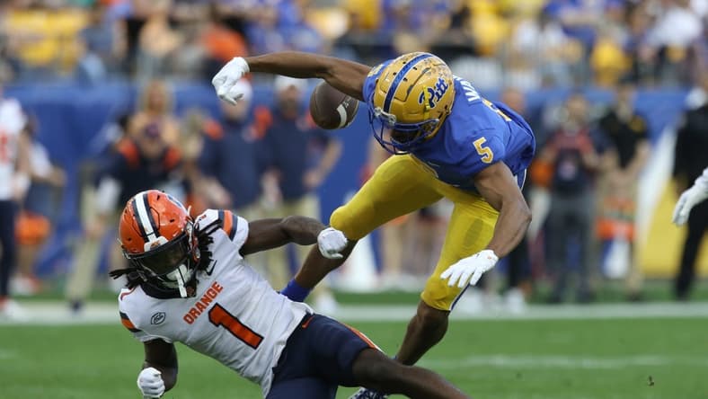 Nov 5, 2022; Pittsburgh, Pennsylvania, USA;  Syracuse Orange defensive back Ja'Had Carter (1) defends a pass intended for Pittsburgh Panthers wide receiver Jared Wayne (5) during the second quarter at Acrisure Stadium. Mandatory Credit: Charles LeClaire-USA TODAY Sports