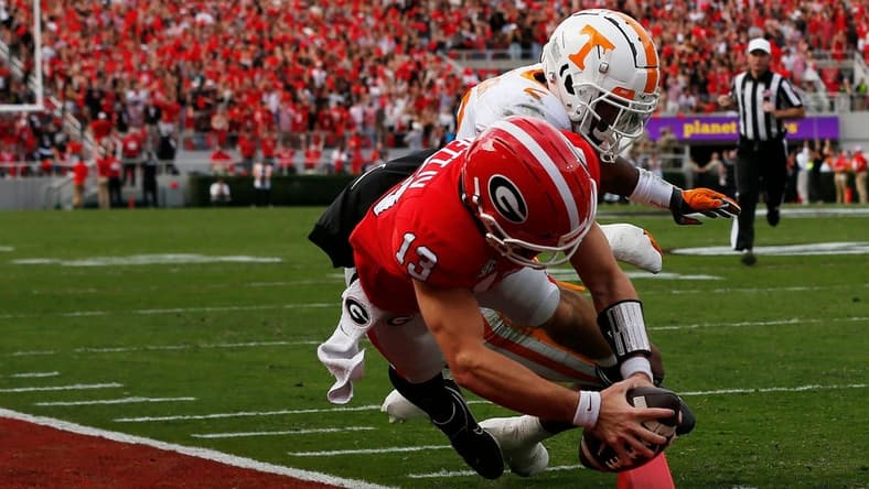 Georgia quarterback Stetson Bennett (13) scores a touchdown during the first half of a NCAA college football game between Tennessee and Georgia in Athens, Ga., on Saturday, Nov. 5, 2022.
News Joshua L Jones
