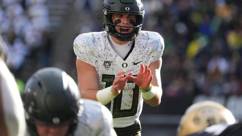 Nov 5, 2022; Boulder, Colorado, USA; Oregon Ducks quarterback Bo Nix (10) calls out for the ball in the third quarter against the Colorado Buffaloes at Folsom Field. Mandatory Credit: Ron Chenoy-USA TODAY Sports