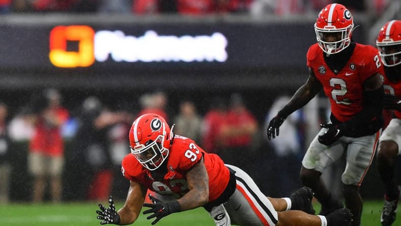 Georgia defensive lineman Tyrion Ingram-Dawkins (93) dives for possession of the ball during Tennessee's game against Georgia at Sanford Stadium in Athens, Ga., on Saturday, Nov. 5, 2022.

Kns Vols Georgia Bp