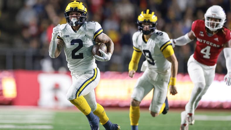 Nov 5, 2022; Piscataway, New Jersey, USA; Michigan Wolverines running back Blake Corum (2) carries the ball against the Rutgers Scarlet Knights during the first half at SHI Stadium. Mandatory Credit: Vincent Carchietta-USA TODAY Sports