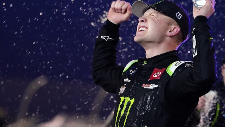Nov 5, 2022; Avondale, Arizona, USA; Xfinity Series driver Ty Gibbs (54) celebrates winning the Xfinity series championship at Phoenix Raceway. Mandatory Credit: John David Mercer-USA TODAY Sports