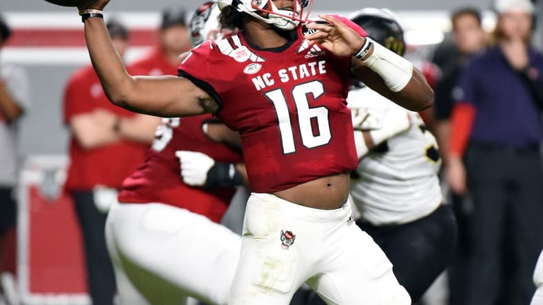 Nov 5, 2022; Raleigh, North Carolina, USA; North Carolina State Wolfpack quarterback MJ Morris (16) throws a pass during the first half against the Wake Forest Demon Deacons at Carter-Finley Stadium. Mandatory Credit: Rob Kinnan-USA TODAY Sports