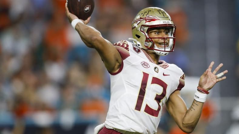 Nov 5, 2022; Miami Gardens, Florida, USA; Florida State Seminoles quarterback Jordan Travis (13) throws the football during the second quarter against the Miami Hurricanes at Hard Rock Stadium. Mandatory Credit: Sam Navarro-USA TODAY Sports