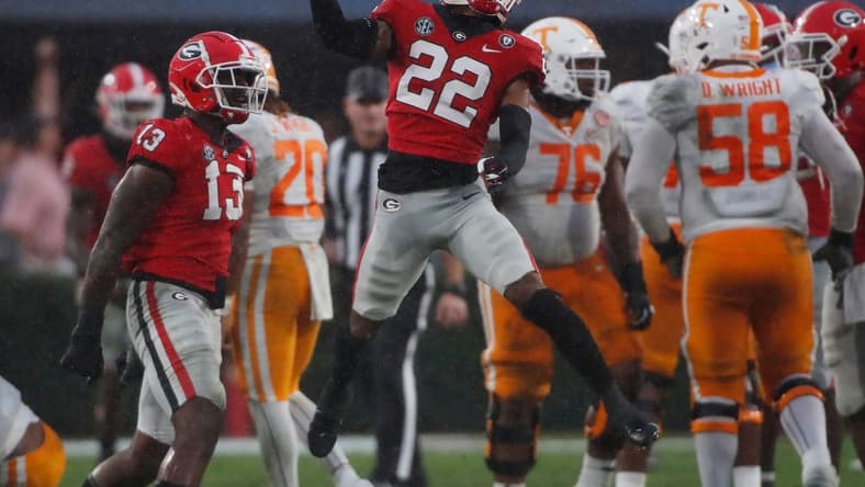 Georgia defensive back Javon Bullard (22) celebrates after sacking Tennessee quarterback Hendon Hooker (5) during the second half of a NCAA college football game between Tennessee and Georgia in Athens, Ga., on Saturday, Nov. 5, 2022. Georgia won 27-13.
News Joshua L Jones